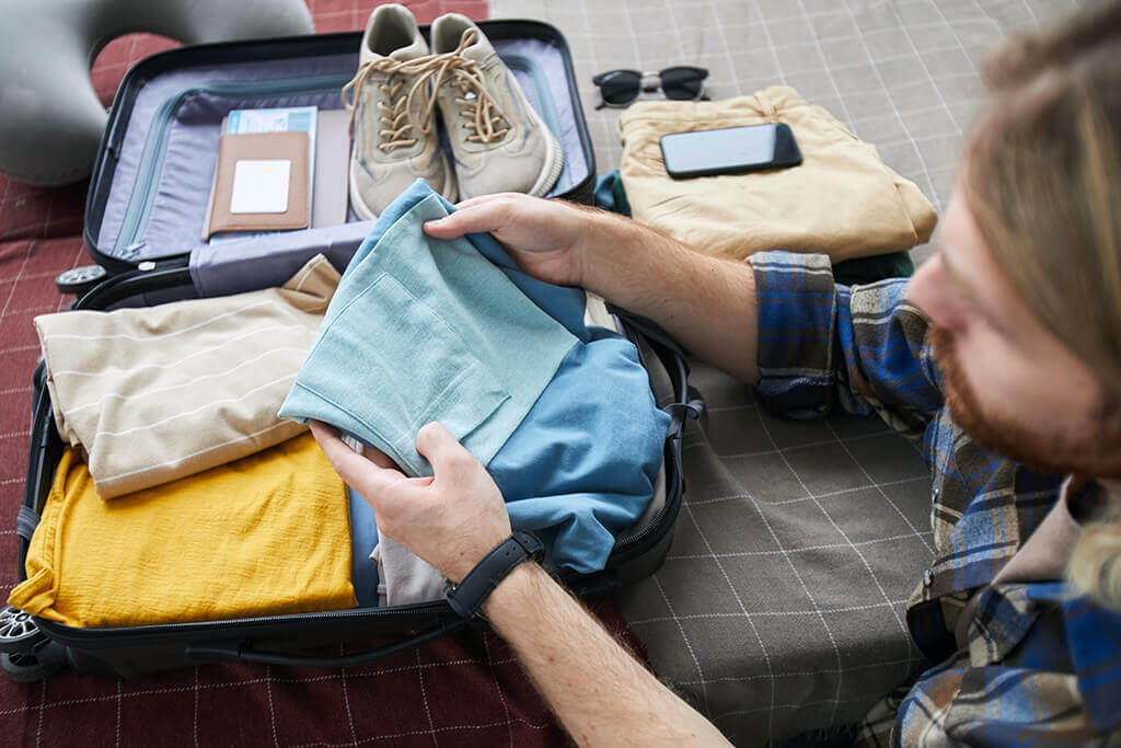 Best Way to Pack Clothes for a Move in Your Suitcase